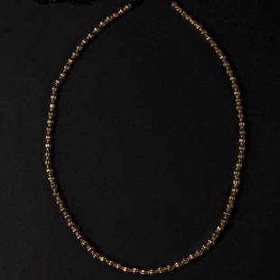 Gold Bead Necklace: A Hollow gold bead necklace. Reserve: $1,500.00 Shipping:Domestic: Flat-rate of $35.00 to anywhere within the contiguous U.S.International: Foreign shipping rates are determined by