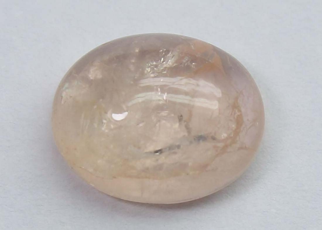 2.90 Cts Natural Morganite: No Reserve! Title: 2.90 Cts Natural Morganite Additional Information: Gemstone: Natural MorganiteOrigin: Africa Weight: 2.90 Carats Measurements: 10x8 mm Calibrated Shape : Oval Cabochon Colour: Peach