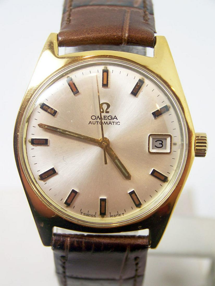 Vintage OMEGA GENEVE Automatic Watch 1960s Cal.565 Ref.: Description Vintage Gold Plated OMEGA Automatic Watch c.1960s Cal.565* EXLNT Condition* SERVICED Ref. 166.041? This Mens Omega watch is Swiss made. Great present for yourself or someone you love as we