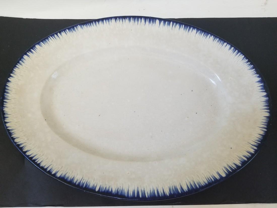Feather Edge Fish Platter 1850-1880: Title: Feather Edge Fish Platter 1850-1880 Dimension: 13 1/4" long Provenance:Blue edge, ironstone body. Origin is England. Shipping: Domestic: Flat-rate of $14.00 to anywhere within the contiguous U.
