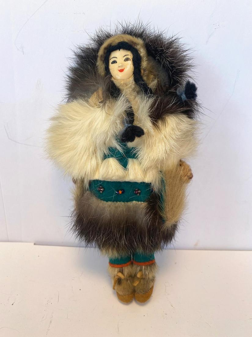 Seal Skin and Rabbit Fur Inuit Doll with Walrus Ivory: Measures 8" by 4". Date/Period is 1960 Shipping: Domestic: Flat-rate of $15.00 to anywhere within the contiguous U.S. International: Foreign shipping rates are determined by destination. Combined ship