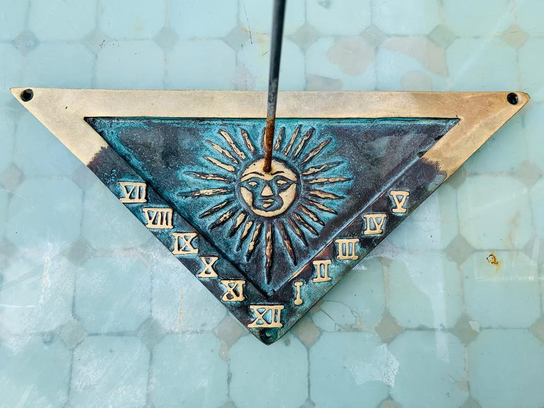 Cupper garden sundial with patinated bronze: Title: Cupper garden sundial with patinated bronze Date/Period: 2nd half 20th century Materials: Copper Dimension: HxWxD: 11.4 x 13.4 x 6.3 inch / 29 x 34 x 16 cm Description:Decorative triangular sun