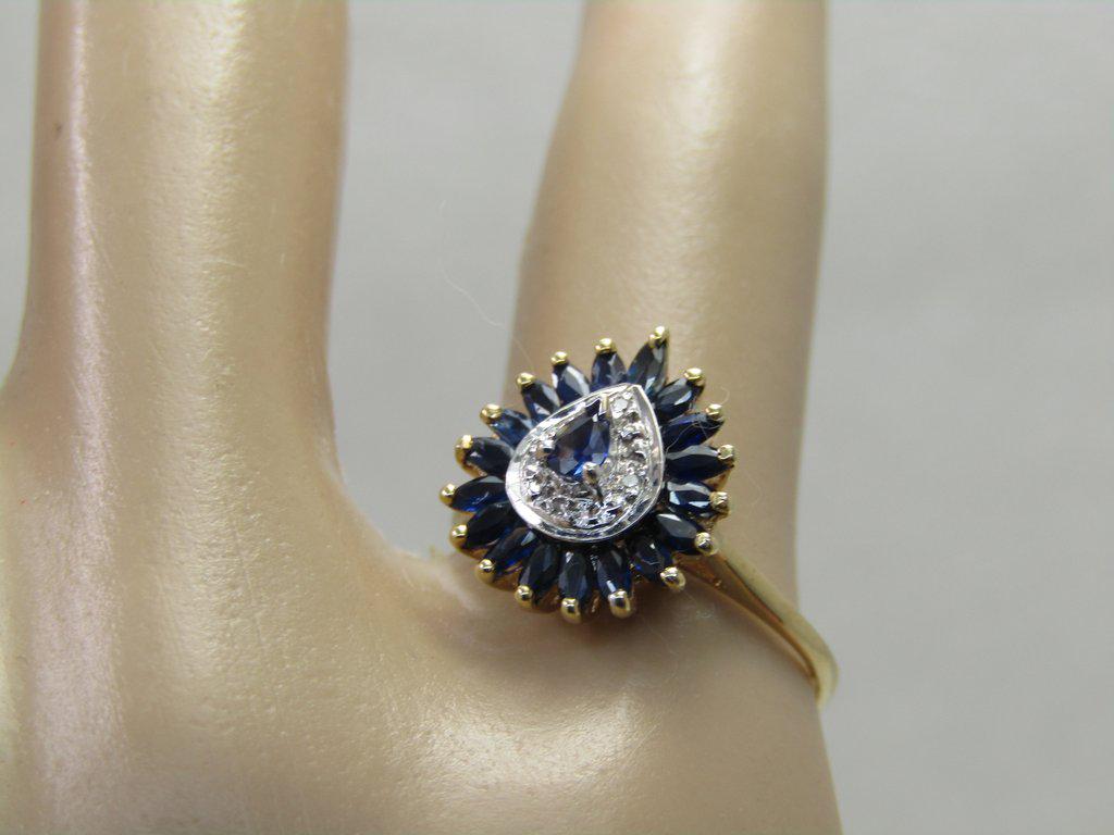 Vintage 10kt Blue Spinel Diamond Halo Ring, Sz. 6, 1.92: 10kt Vintage Deep Sapphire Blue Spinel Halo Ring, Diamond Chips, Sz. 6. Appx. 1.92 gr. Two-tone. This has a raised center pear-shaped stone that is appx. 3.5mm by 2.5mm it has a halo around that has s