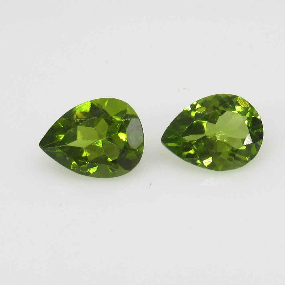 2.25 Ctw Natural Pakistan Peridot Pear Pair: Title: 2.25 Ctw Natural Pakistan Peridot Pear Pair Stone Clarity: VVS Gemstones: Peridot Carat Weights: 2.25 Size/Dimensions: 7.80 x 6.00 x 4.00 mm / 2 PC's Additional Information: Top Class Luster / 