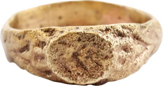 ANCIENT MEDIEVAL EUROPEAN RING 11-13th CENTURY JEWELRY: Size 3 with deeply rounded face tapered band, 3.2mm at the bottom. Raised oval bezel cut with chevrons, probably serving as a signet ring to seal wax and clay replacing an inked signature. Made by the