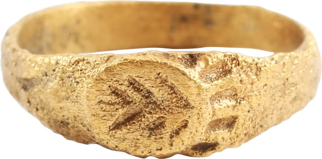 MEDIEVAL EUROPEAN RING. 11th-13th century.: Size 4 1/4 with low rounded face tapered band. Raised oval bezel cut with four chevrons, probably serving as a signet ring to seal wax and clay replacing an inked signature. Professionally refurbished