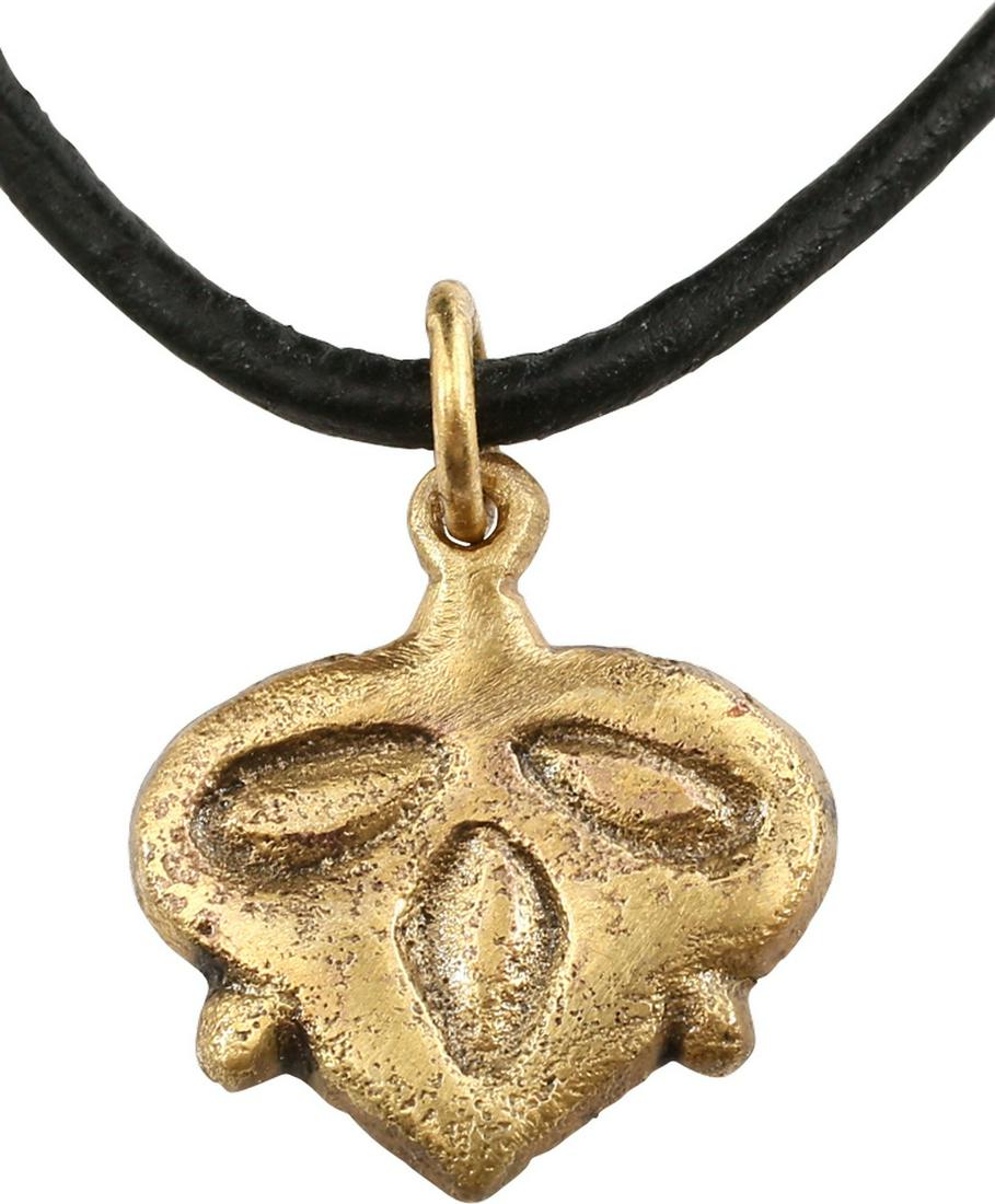 VIKING HEART PENDANT 900-1050 AD.: Just under 3/4” width of flat form, made by the open face mold method. Broad border with a central trefoil motif. The form of the heart is natural as in the body rather than stylized with the top cu