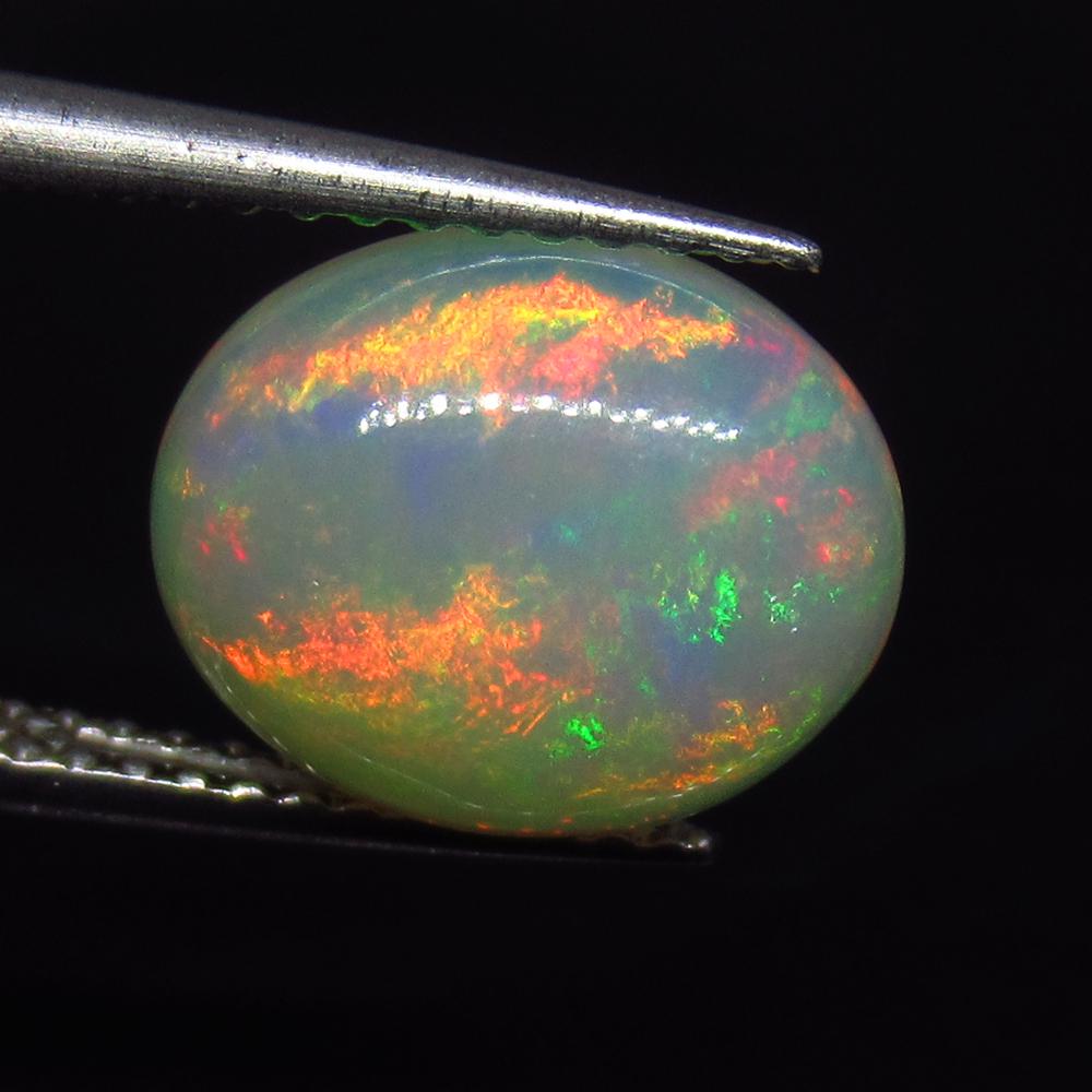 2.74 Ct Natural Multi-Color Fire Opal Oval Cab (1 of 2)