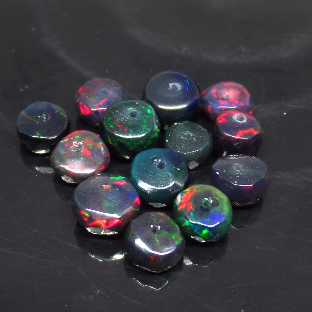 6.81 Ct Natural 13 Drilled Faceted Fire Black Opal: No Reserve! Title: 6.81 Ct Natural 13 Drilled Faceted Fire Black Opal Beads Color/Clarity: Translucent Gemstone: Natural Faceted Black Opal Beads Carat Weight: 6.81 Size/Dimensions: 4.90 to 6.00 mm / 