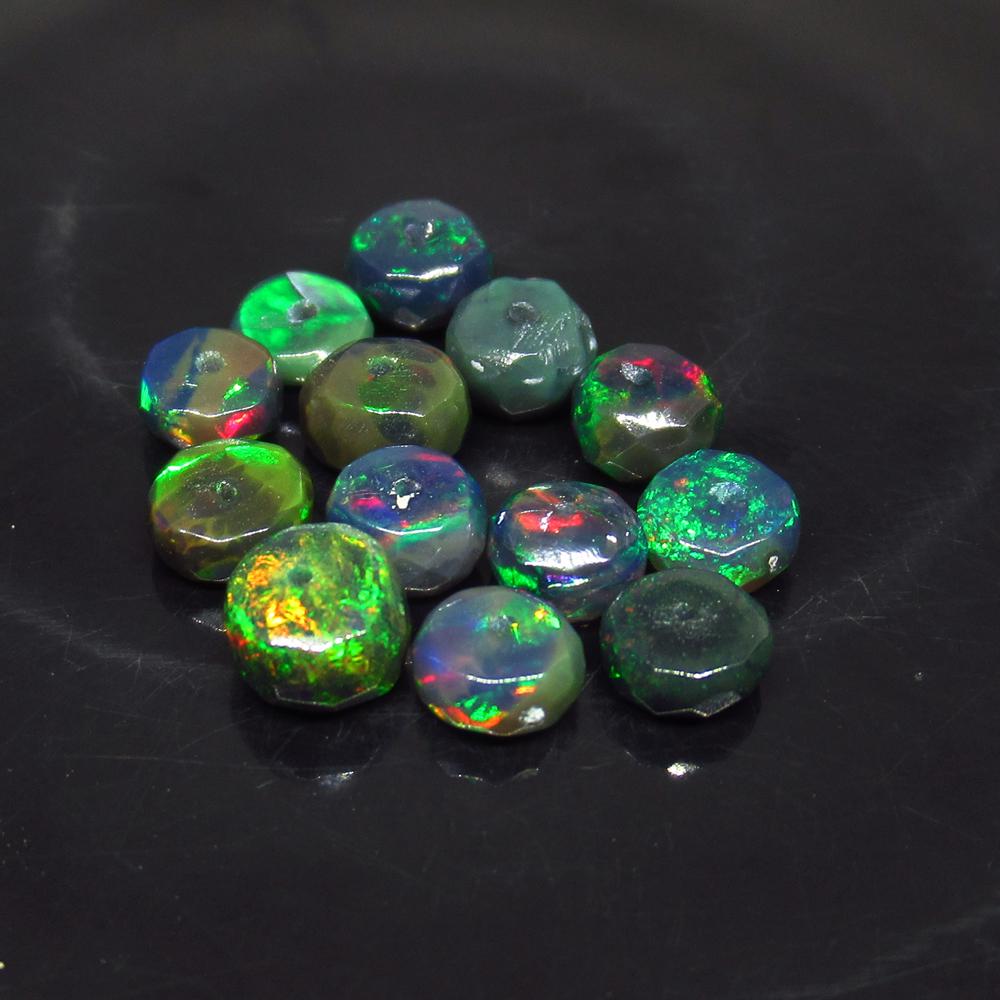 5.17 Ct Natural 13 Drilled Faceted Fire Black Opal: No Reserve! Title: 5.17 Ct Natural 13 Drilled Faceted Fire Black Opal Beads Color/Clarity: Translucent Gemstone: Natural Faceted Black Opal Beads Carat Weight: 5.17 Size/Dimensions: 5.10 to 5.50 mm / 