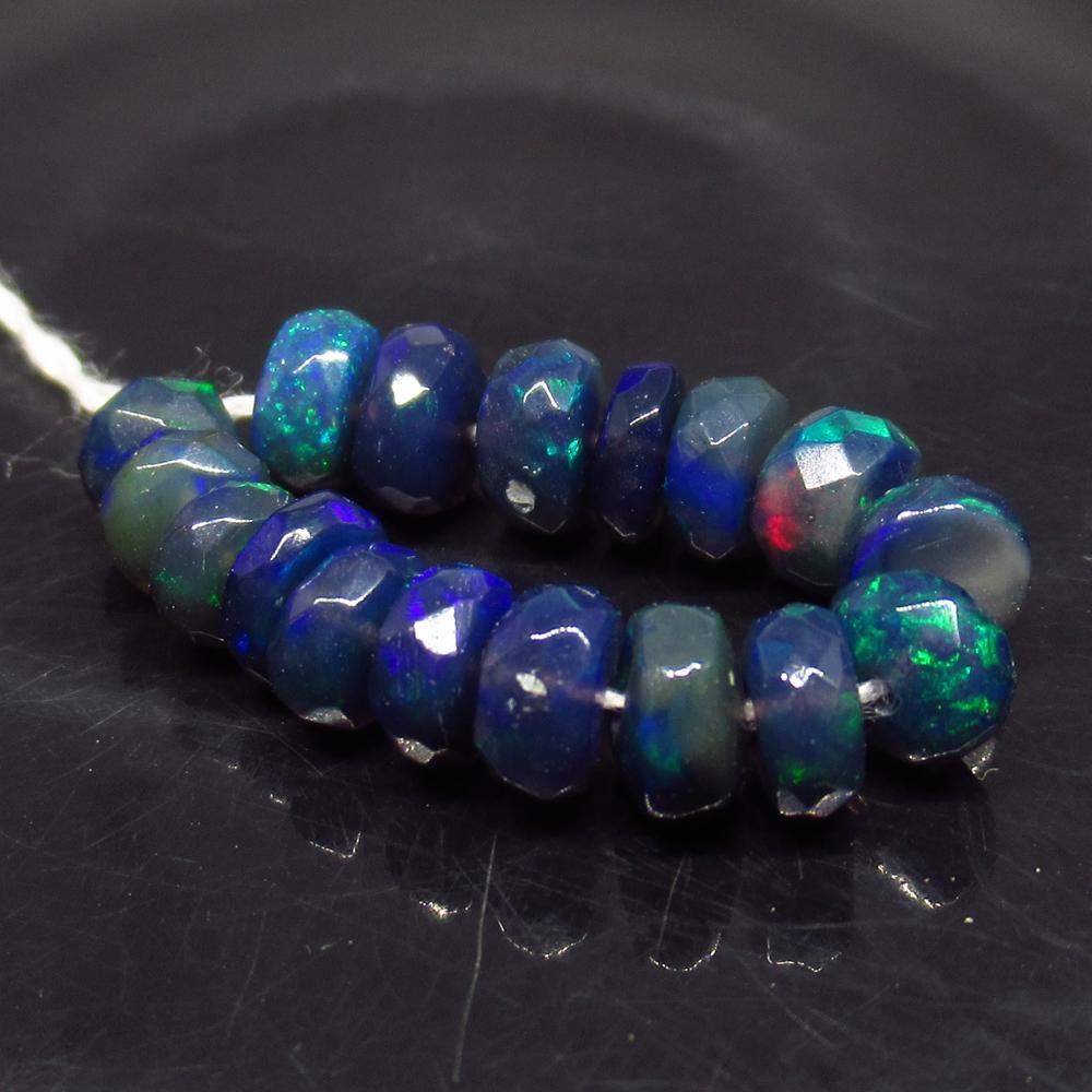 5.22 Ct Natural 17 Drilled Faceted Fire Black Opal: No Reserve! Title: 5.22 Ct Natural 17 Drilled Faceted Fire Black Opal Beads Color/Clarity: Translucent Gemstone: Natural Faceted Black Opal Beads Carat Weight: 5.22 Size/Dimensions: 4.50 to 4.90 mm / 