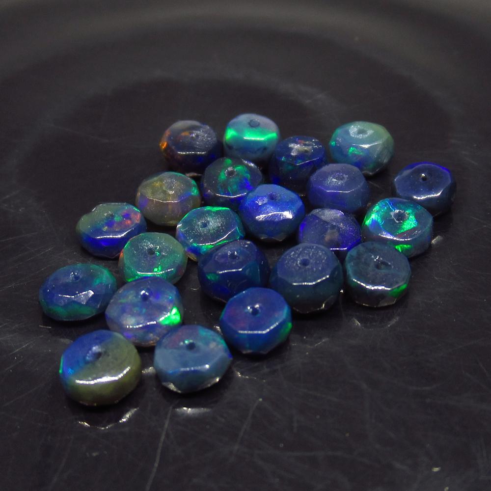 5.84 Ct Natural 22 Drilled Faceted Fire Black Opal: No Reserve! Title: 5.84 Ct Natural 22 Drilled Faceted Fire Black Opal Beads Color/Clarity: Translucent Gemstone: Natural Faceted Black Opal Beads Carat Weight: 5.84 Size/Dimensions: 4.30 to 4.60 mm / 