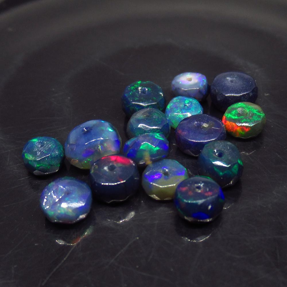 6.21 Ct Natural 15 Drilled Faceted Fire Black Opal: No Reserve! Title: 6.21 Ct Natural 15 Drilled Faceted Fire Black Opal Beads Color/Clarity: Translucent Gemstone: Natural Faceted Black Opal Beads Carat Weight: 6.21 Size/Dimensions: 4.30 to 5.80 mm / 