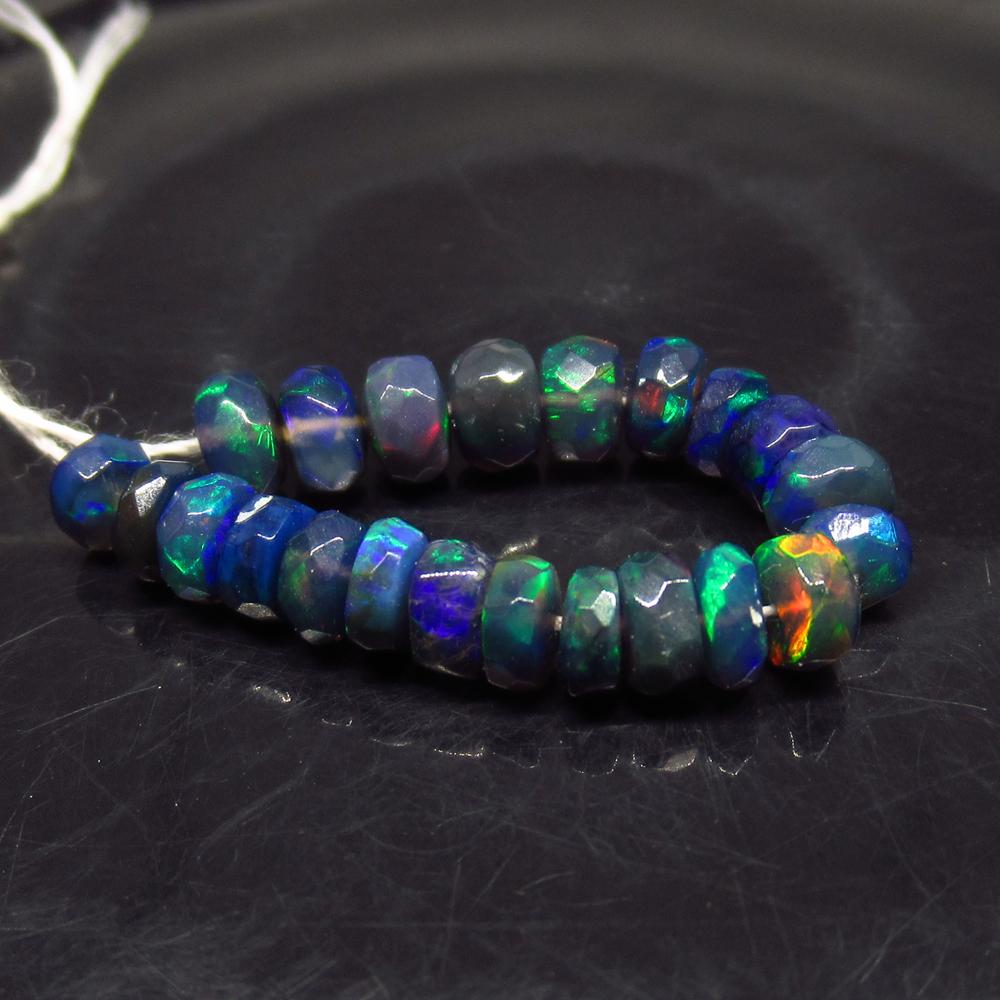 4.97 Ct Natural 22 Drilled Faceted Fire Black Opal: No Reserve! Title: 4.97 Ct Natural 22 Drilled Faceted Fire Black Opal Beads Color/Clarity: Translucent Gemstone: Natural Faceted Black Opal Beads Carat Weight: 4.97 Size/Dimensions: 3.80 to 4.50 mm / 