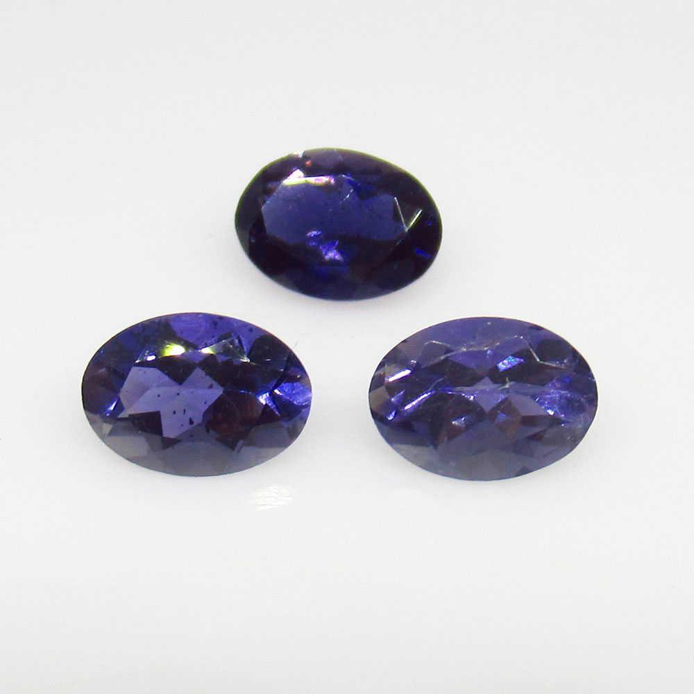 1.96 Ctw Natural 3 Iolite Oval Set: No Reserve! Title: 1.96 Ctw Natural 3 Iolite Oval Set Stone Clarity: VVS Gemstones: Iolite Carat Weights: 1.96 Size/Dimensions: 7.0x5.1 - 7.1x5.3 mm / 3 PC's Additional Information: Very Good Luster /