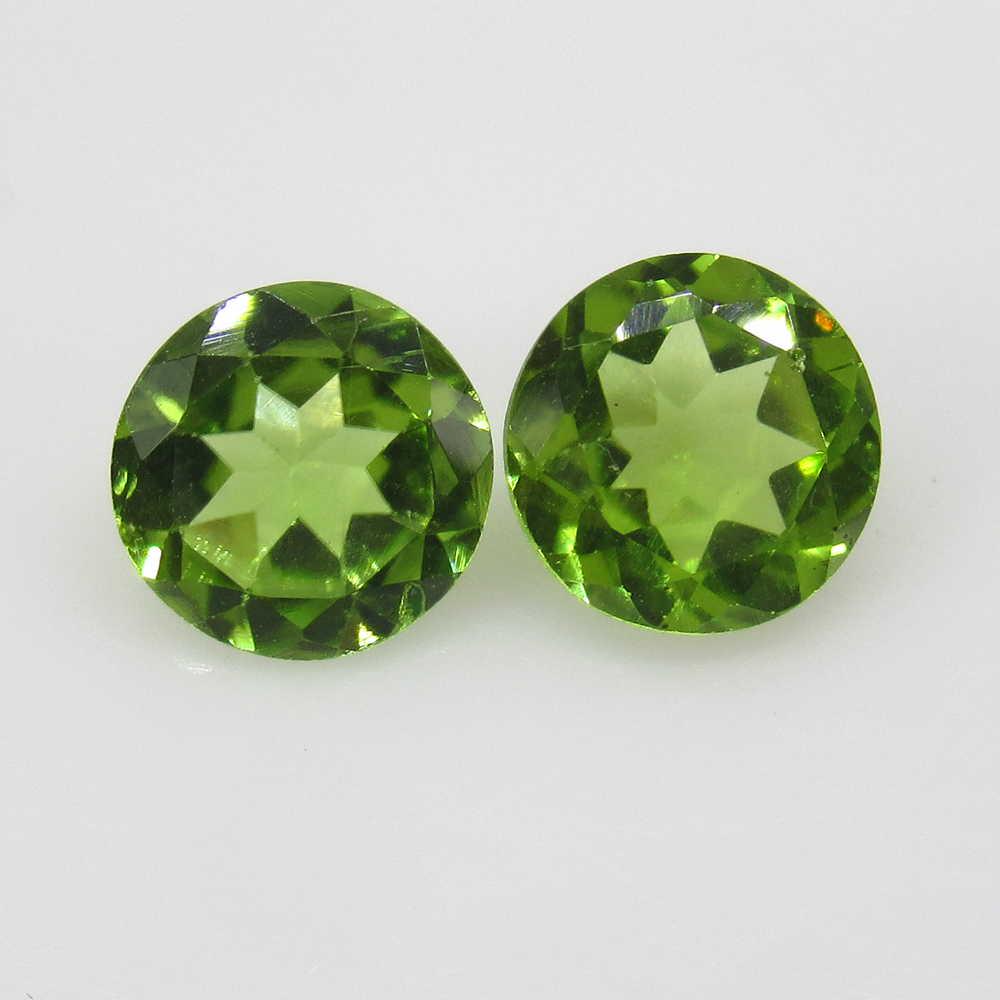 2.70 Ctw Natural Pakistan Peridot Round Pair: No Reserve! Title: 2.70 Ctw Natural Pakistan Peridot Round Pair Stone Clarity: VVS Gemstones: Peridot Carat Weights: 2.7 Size/Dimensions: 7.40 x 7.40 x 4.10 mm / 2 PC's Additional Information: Top Cla