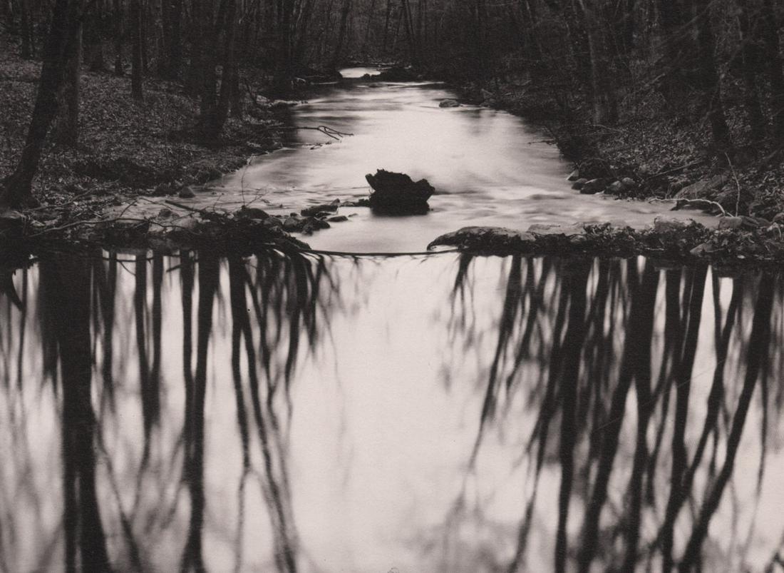 PAUL CAPONIGRO - Cascade in Redding Woods,1968: Artist: PAUL CAPONIGRO Print Title: Cascade in Redding Woods Medium: Photo-lithograph Printed 1980’s in France Image size (inches) approx. 6 x 8” Artist Bio: Paul Caponigro (1932), is an American 
