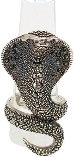 Silver Marcasite Serpent Snake Ring 925 Thailand: Silver Marcasite Serpent Snake Ring 925 Thailand We offer this unique eye catching serpent ring encrusted in marcasite and intricate design. The ring is sure to attract attention The ring is set on on
