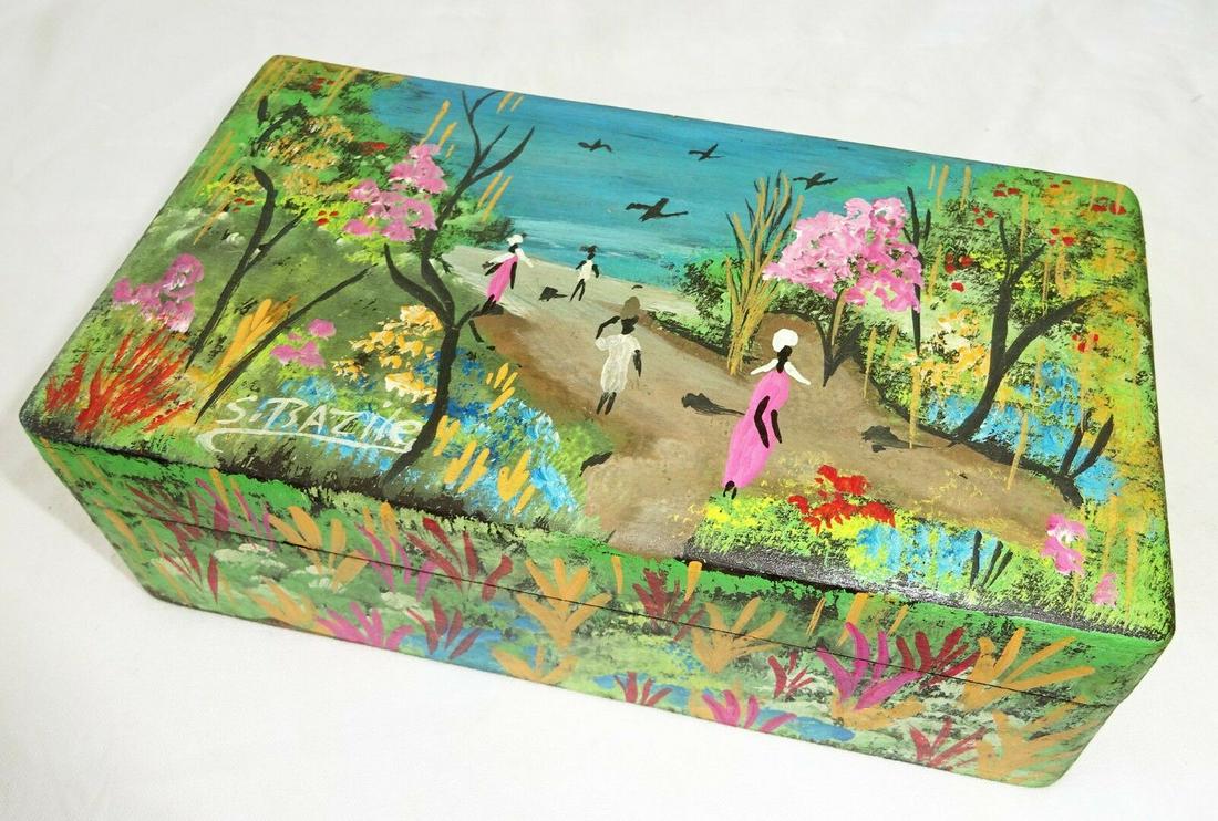 80s Haitian Wood Boxes w Painted Landscape S. Bazile: Up for auction from recent client in Honolulu this 1980s Haitian wooden covered box that features a hand painted wrap around colorful landscape motif with figures and is signed S. Bazile. This and all