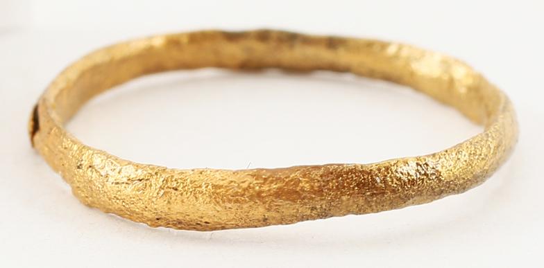 VIKING WOMAN’S WEDDING RING SIZE 5.: Late 9th-early 11th century AD. Size 5. Rounded face, 1.9mm width. Very light texture from burial. Vikings exchanged rings on the pommel of the groomÂ’s sword. Professionally refurbished with the 2