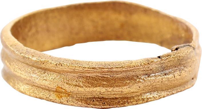 ANCIENT VIKING WEDDING RING 9TH-10TH CENTURY AD JEWELRY: Size 8. Broad 4.9mm width. Flat band, each edge with an impressed line giving a triple band effect. Surface with evidence of burial. Vikings exchanged rings on the pommel of the groom’s sword. Profe