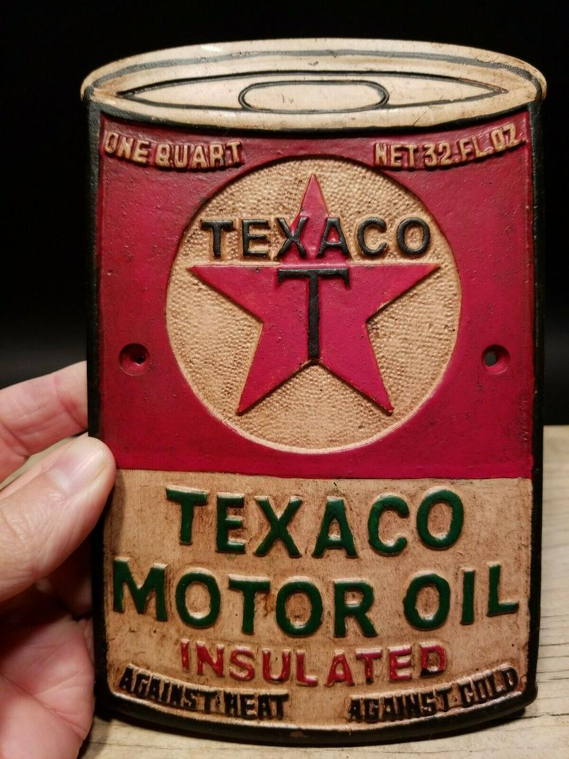 Cast Iron Texaco Motor Oil Sign Plaque: Description 7 1/2" tall x 4 3/4" Wide Well made reproduction Texaco motor oil plaque. As you can see this metal sign is aged and made to look like a real antique. Makes a great display! Be sure to che