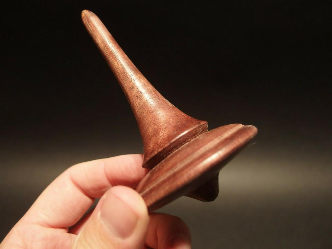 Wood Spinning Top Toy: 4 1/2" Tall x 2 5/8" wide Wonderful reproduction american antique wood turned spinning top. Handmade wood spinning tops like this were some of the oldest and simplest toys made. Children who frequentl