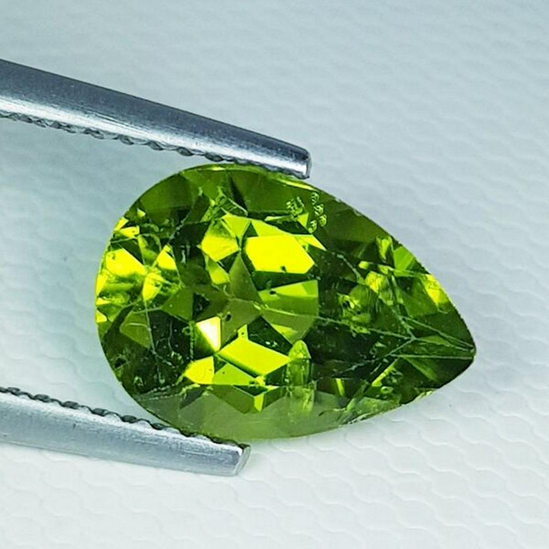3.07 ct Natural Peridot Pear Cut: No Reserve! Title: 3.07 ct Natural Peridot Pear Cut Color/Clarity: VVS Gemstones: Loosegemstone Carat Weights: $3 Size/Dimensions: 11.00 x 7.80 x 5.50 Additional Information: Pear - Pakistan Shipping: