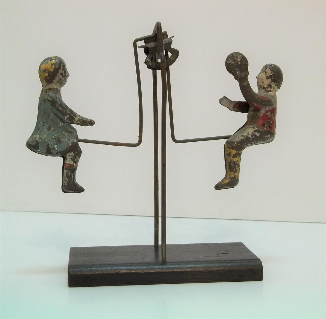 Tin Figures, Two Children on a Swing (1 of 4)