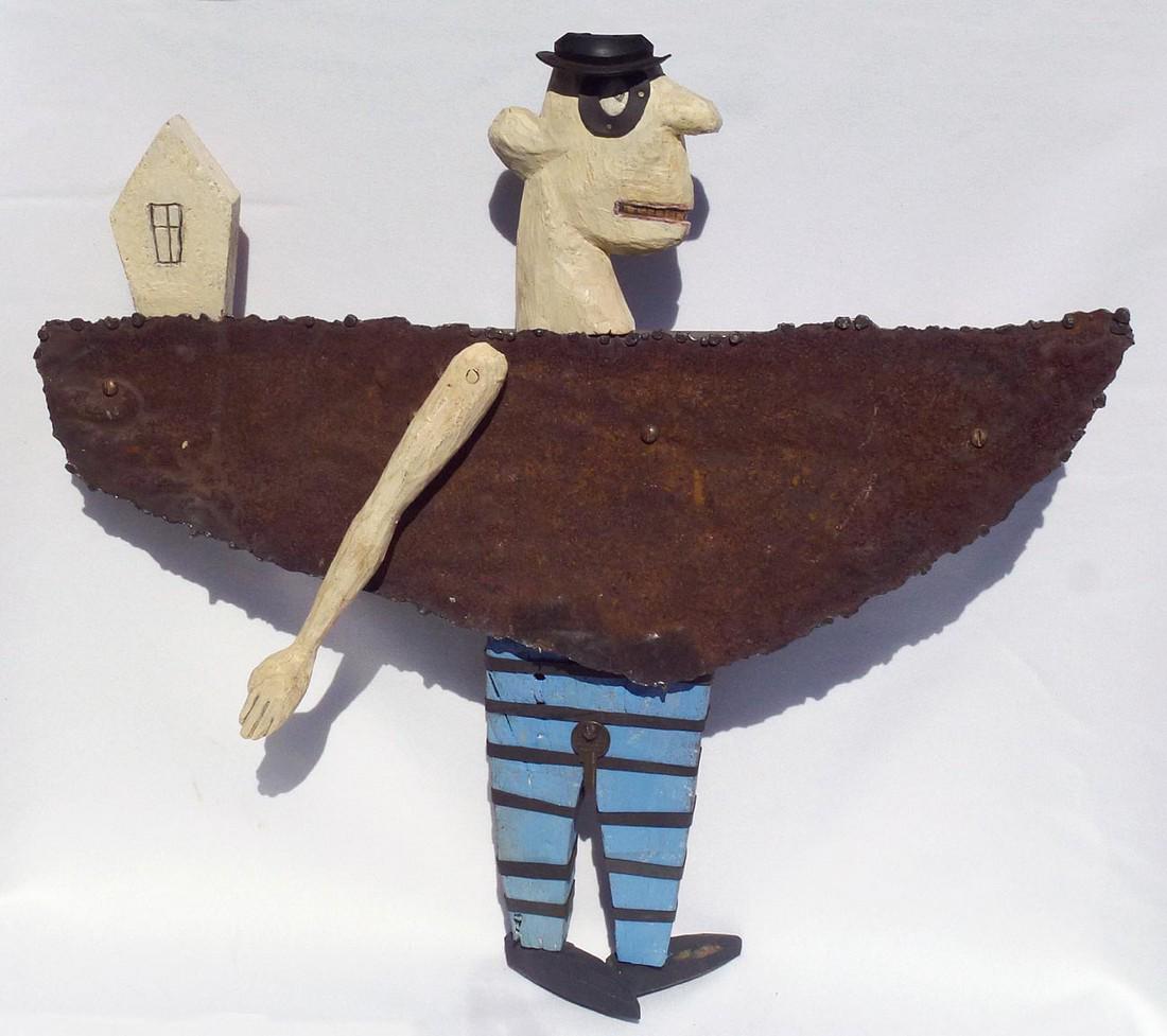 A funky sculptural assemblage of a man wearing a boat (1 of 7)