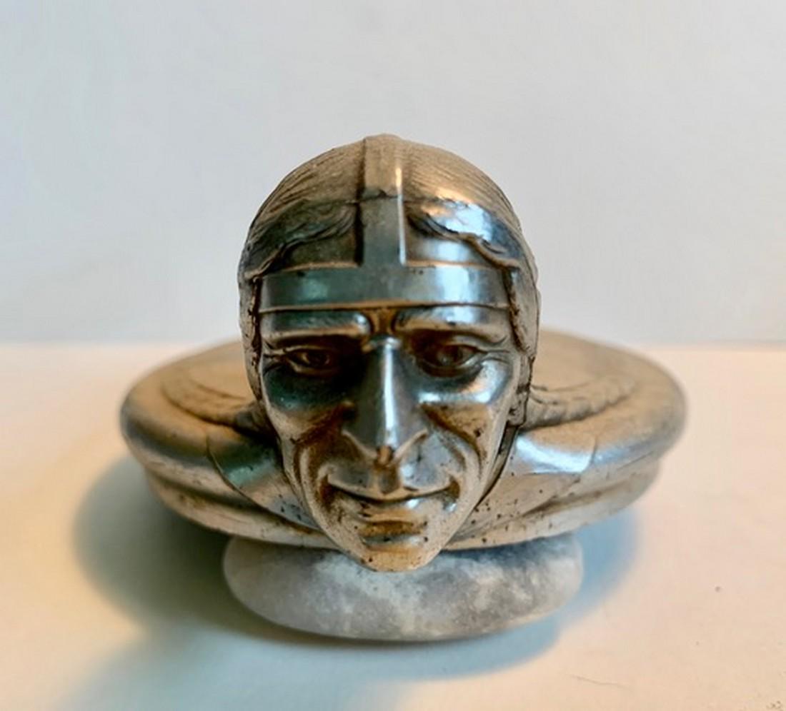 Pontiac Indian Head Hood Ornament / Radiator Cap: Title: Pontiac Indian Head Hood Ornament / Radiator Cap Date: circa 1920s - 30s Material: Measures 4.5” long x 2” tall. Add Info/Provenance: In good condition for age. Natural pitting to surface f