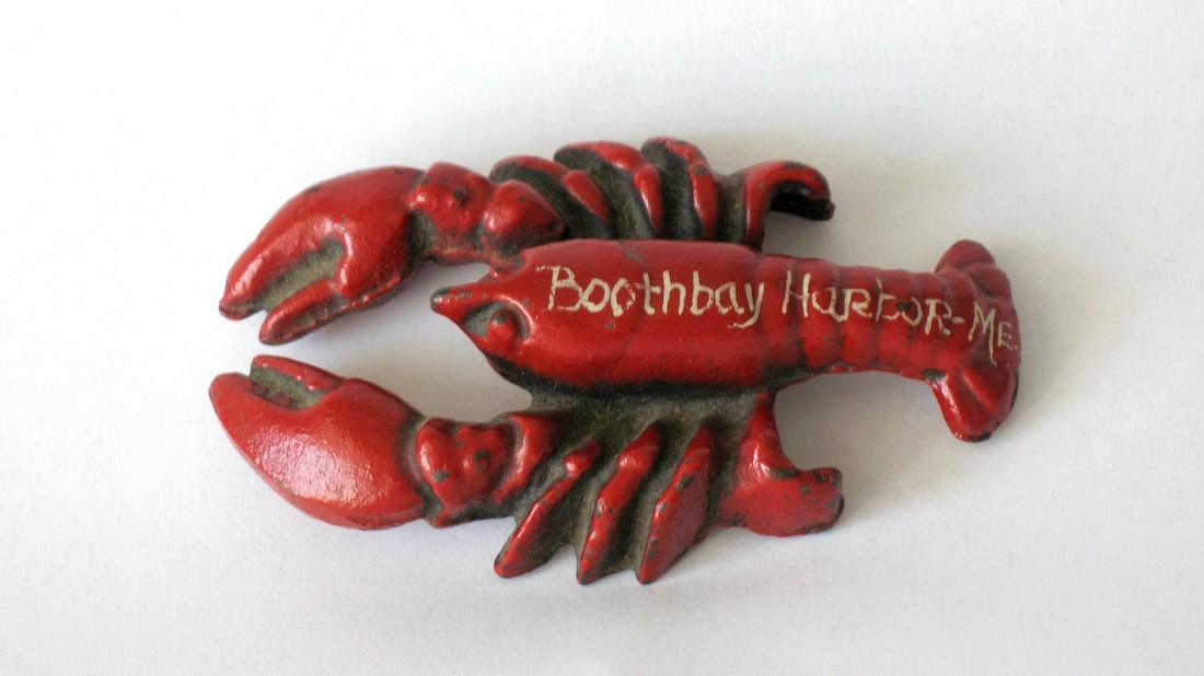 Vintage cast iron lobster Booth Bay Harbor, Maine: Title: Vintage cast iron lobster Booth Bay Harbor, Maine Description: Nice vintage cast iron lobster paper weight or bottle opener, marked Booth Bay Harbor, Maine. Dimensions: 4” long Circa: 1950's 