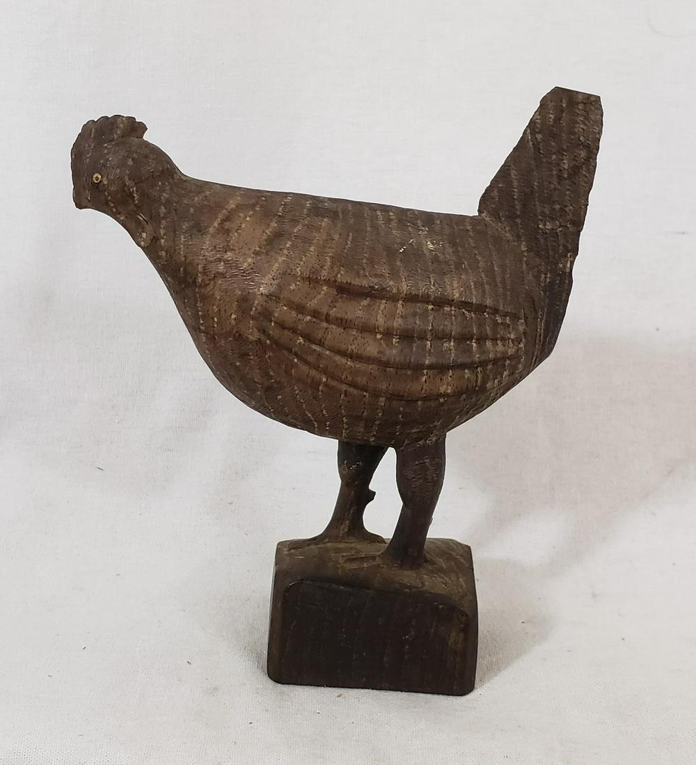 Miniature carved rooster ca 1900: Title: Miniature carved rooster ca 1900 Dimensions: 4 3/4" tall x 4" long Provenance/Additional Info: Hardwood carved and very finely detailed bird with wattle and spurs. Bone or ivory eye. No loss or