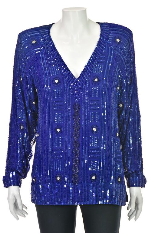 OLEG CASSINI Vintage Royal Blue Sequined and Beaded: Gorgeous royal blue vintage evening top from Oleg Cassini is covered in irridescent blue sequins and bugle beads with a "cable stitch" pattern in beads down the front of the top. It has raglan sleeves