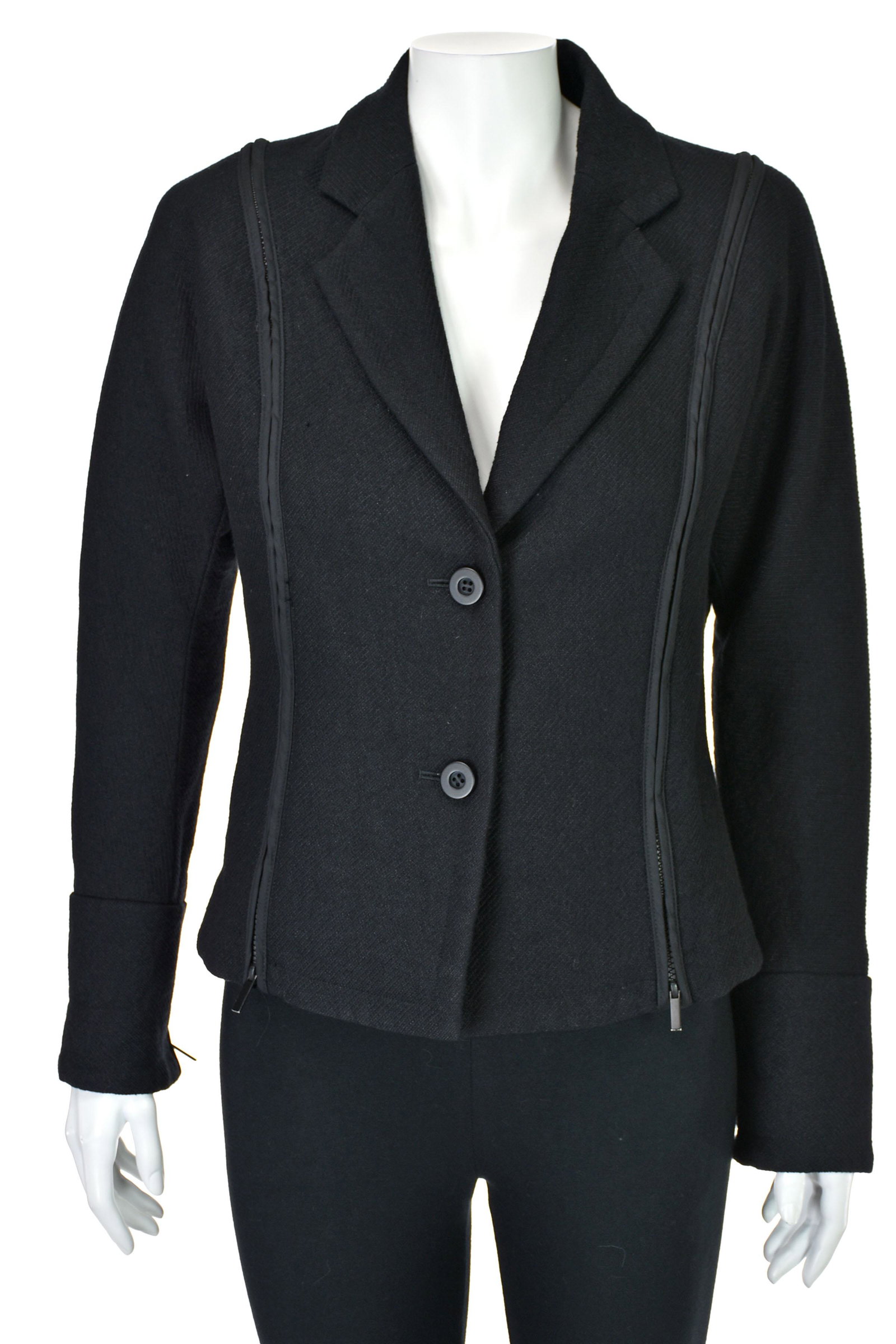 ISSEY MIYAKE Black Expandable Jacket: At first glance, this appears to be a somewhat normal, two-button black wool blazer with an interesting texture. However, in typical Issey Miyake style, this jacket is not what it seems. You can actua