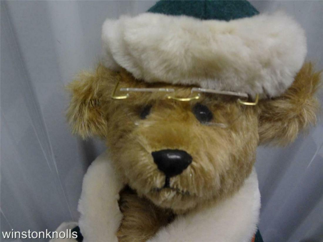SANTA BEAR 16 INCHES IN GREEN COAT BY CHARLOTTE JOYNT: SANTA BEAR 16 INCHES IN GREEN COAT BY CHARLOTTE JOYNT 1988 S. KNUTZEN Description SANTA BEAR 16 INCHES MARKED ON BASKET 1988 S.KNUTZEN BY CHARLOTTE JOYNT ARTIST MADE BEAUTIFUL BEAR AGAIN BASKET SIGNED