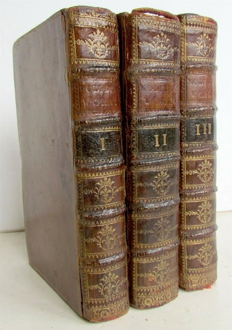 1714 3 volumes WORKS OF MONSIEURE DE MOLIERE in ENGLISH: THE WORKS OF MONSIEURE DE MOLIERE in SIX VOLUMES (bound in 3 books) London: Printed for Bernard Lintott, 1714. [30],207,[3];[2],210,[2];[4],288;[4],288;[4],21 9,[1];268pp. Engraved frontispiece portra