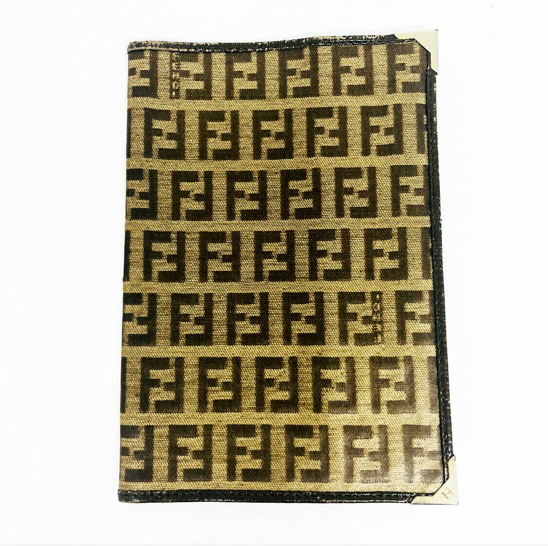 Vintage FENDI Signature Double F Canvas Brown Leather: KG GT Vintage FENDI Signature Double F Canvas Brown Leather Passport Holder Brown Leather Double F pattern canvas Closed: 4”W x 6”L Opened: 8.25”W Please see the pictures for the details A MUST 