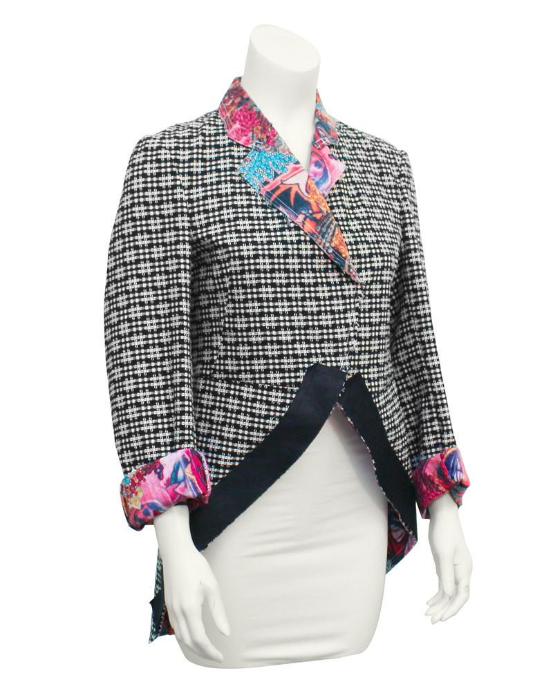 Comme Des Garcons Black & white jacket with contrasting: New, never worn cotton and polyester 2003 Comme Des Garcons avant garde equestrian style jacket. The jacket is covered with a abstract checkered pattern, while the lining is a colorful abstract graphi