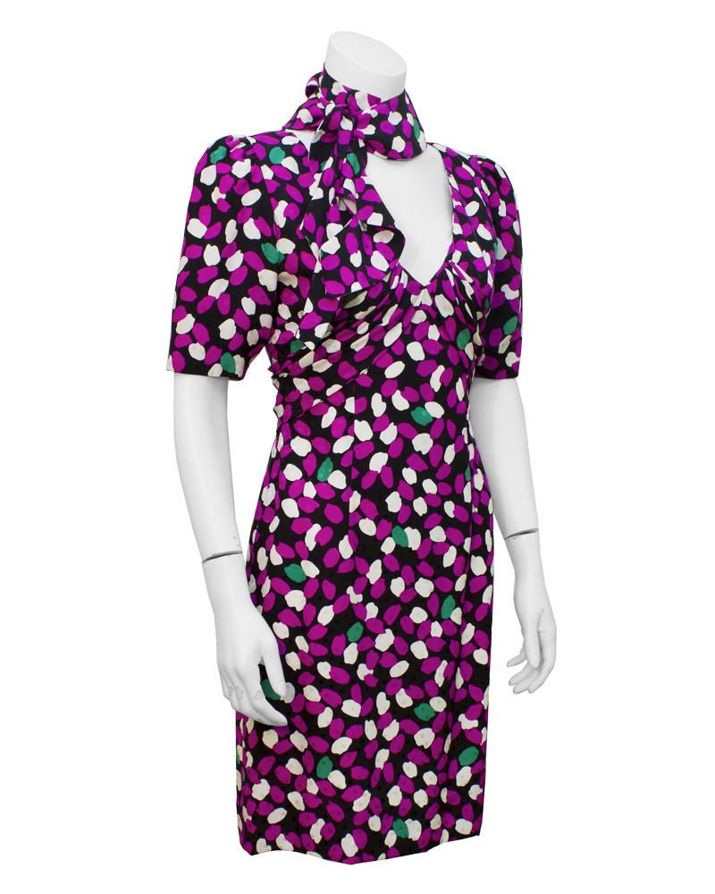 Givenchy Flower Petal Print Dress with Neck Tie: Fresh as a Summer day! Lovely 1980's Givenchy silk printed dress with detached tie collar. Feminine and flirty, it makes for a perfect spring dress when paired with a leather jacket or classic denim. 