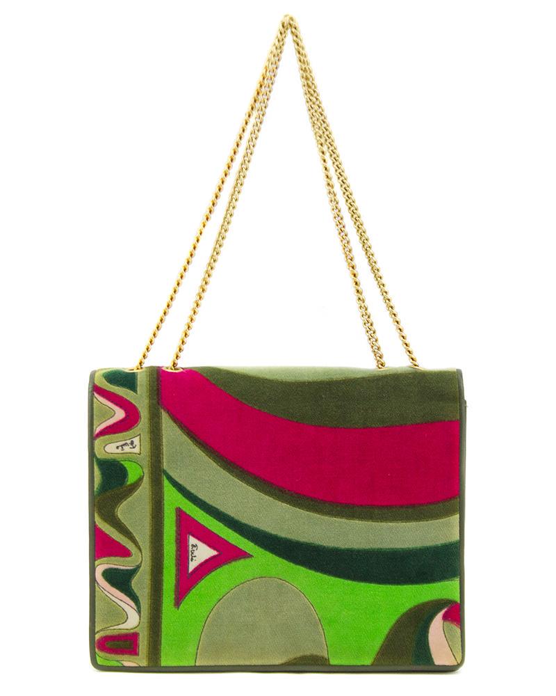 Emilio Pucci Green and Pink Velvet Evening Bag: Gorgeous 1970's Emilio Pucci velvet evening bag. The front flap and back feature a classic Pucci print in green and hot pink on velvet. The rest of the bag is constructed of olive green leather with a