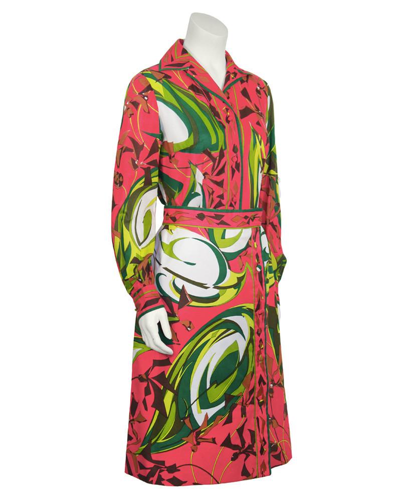 Emilio Pucci Pink and Green Cotton Print Set: Near mint condition cotton print shirt and skirt from 1970's Emilio Pucci collection for Saks 5th Ave. Hanky weight cotton top with fabric covered buttons and border. This top can be worn over pants i