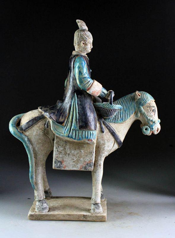 Superb Chinese Female pottery rider Ming Dynasty / w TL: A very scarce and beautiful Chinese pottery tomb figure of a female rider / Attendant on horseback holding a Basket, Ming Dynasty, 1368-1644 AD. This figure is TL Tested (termoluminiscense) by Ralf Ko