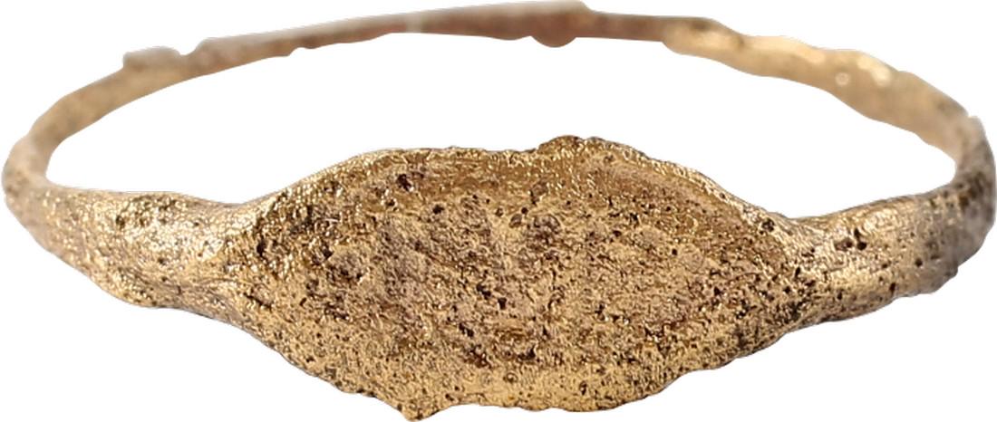 MEDIEVAL EUROPEAN RING,11th-13th CENTURY S9: Size 9 with rounded face narrow, 1.1mm, band. pointed oval bezel cut with six hatched marks, probably serving as a signet ring to seal wax and clay replacing an inked signature. Surface textured from 