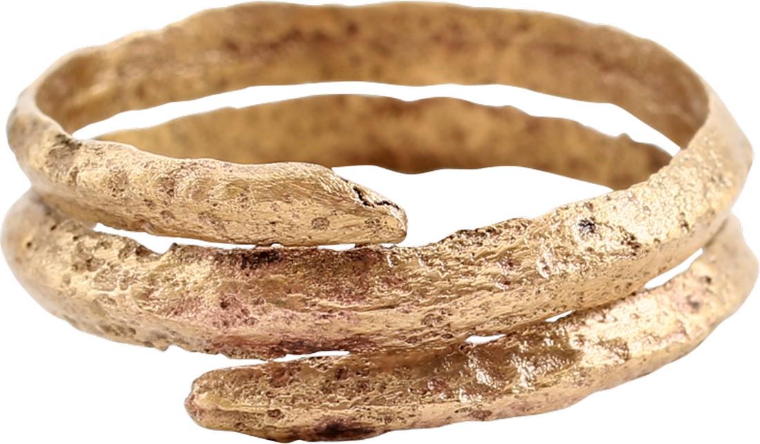 VIKING COIL RING C.900-1050 AD 9 3/4.: Size 9 3/4. Gilt bronze. Ridged face band in 2 full coils to 5.7mm width. The coil or helix was a favorite form for Vikings and evidently held supernatural significance to them. Textured from burial. 