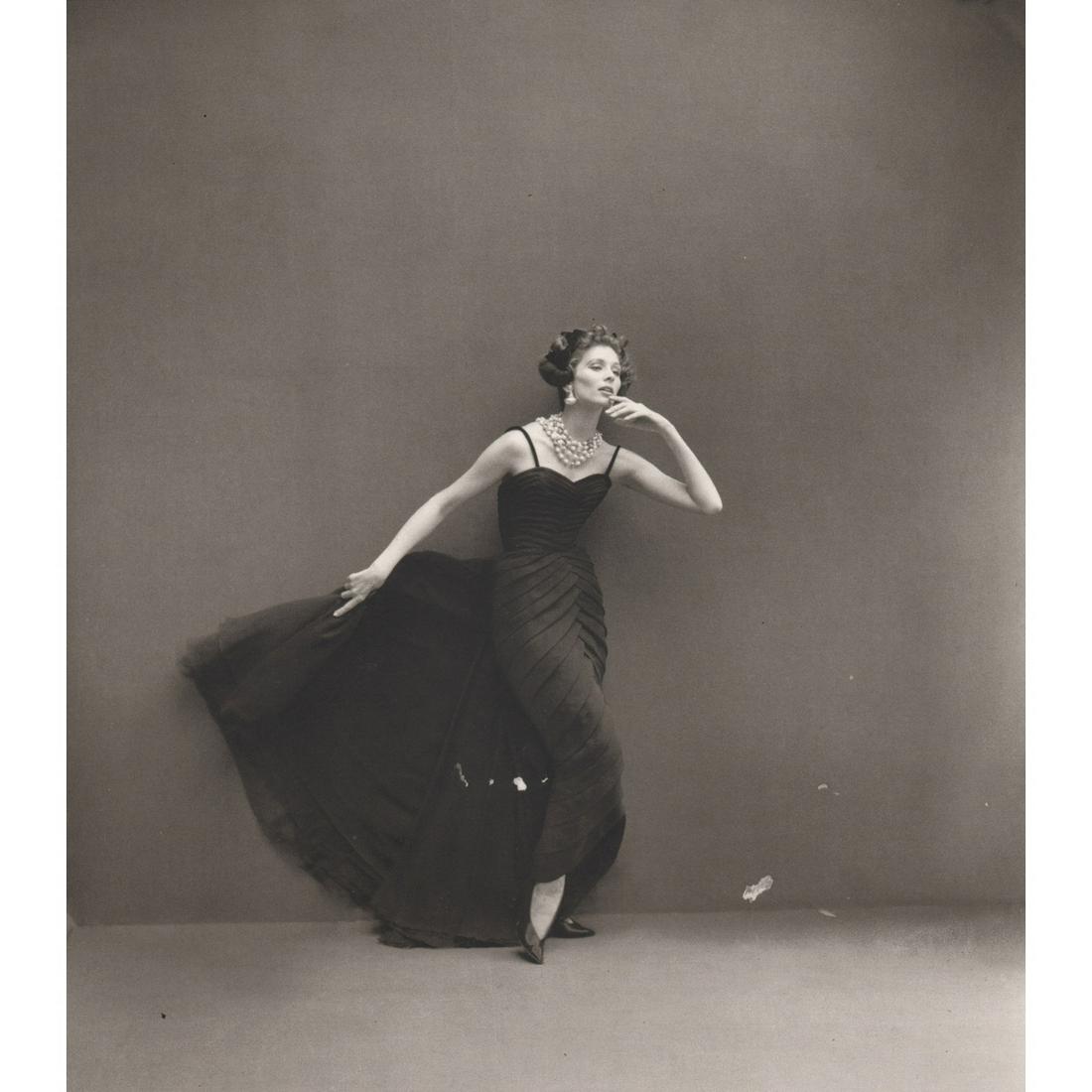 RICHARD AVEDON - Suzy Parker wearing Desses, 1956: Artist: RICHARD AVEDON Print Title: Suzy Parker wearing Desses, 1956 Suzy Parker (1932-2003) was an American model and actress active from 1947 into the early 1960s. Her modeling career reached its ze