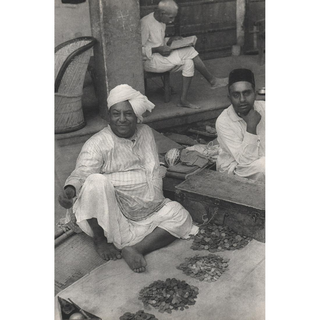 HENRI CARTIER-BRESSON - Money Changer, Jaipur India: Artist: HENRI CARTIER-BRESSON Print Title: Money Changer, Jaipur India 1948 Medium: Sheet-fed Gravure Printing Date: 1950's Printed in France Image Size approx: 13.5 x 9 inches Henri Cartier-Bresson (