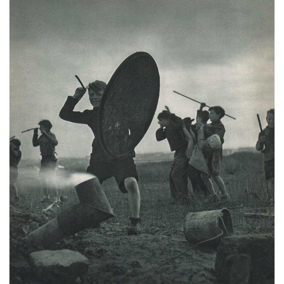 ROBERT DOISNEAU - Children playing, Paris: No Reserve! Artist: ROBERT DOISNEAU Print Title: Children playing in the Gare District, Paris Medium: Sheet-fed Gravure Printing Date: 1950's Printed in France Image Size approx: 9 x 8 inches Robert D