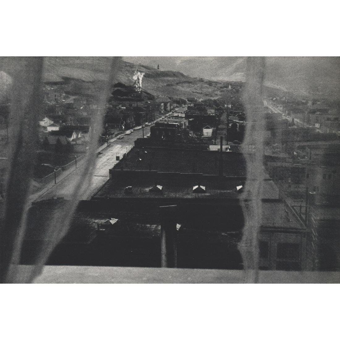 ROBERT FRANK - Butte, Montana: Artist: ROBERT FRANK Print Title: Butte, Montana Medium: Sheet-fed Gravure Printing Date: 1950's Printed in France Image Size approx: 5 x 7.75 inches Robert Frank (b. 1924) is an American photographer