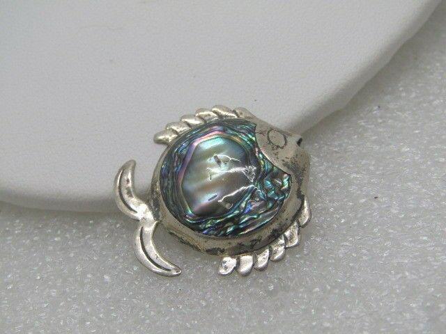 Vintage Sterling Abalone Fish Brooch, Taxco Mexico,: Vintage Sterling Abalone Fish Brooch, Taxco, Mexico, signed ARH and T8-21 or TB-21. Weight is 3.52 grams. It is 1-1/8" from nose to tail and the same tall. The abalone is inlaid in a bezel framel. Age